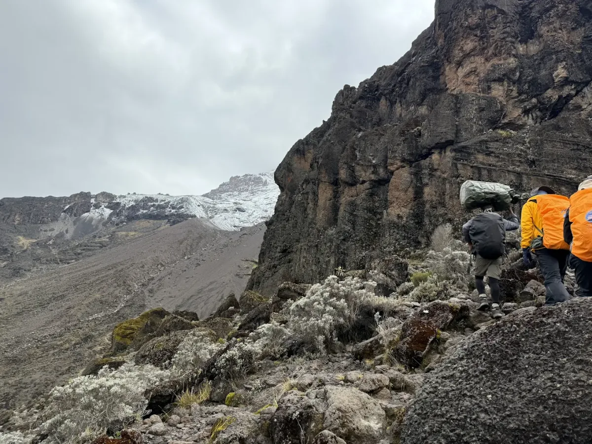 Hikers following a rocky mountain trail