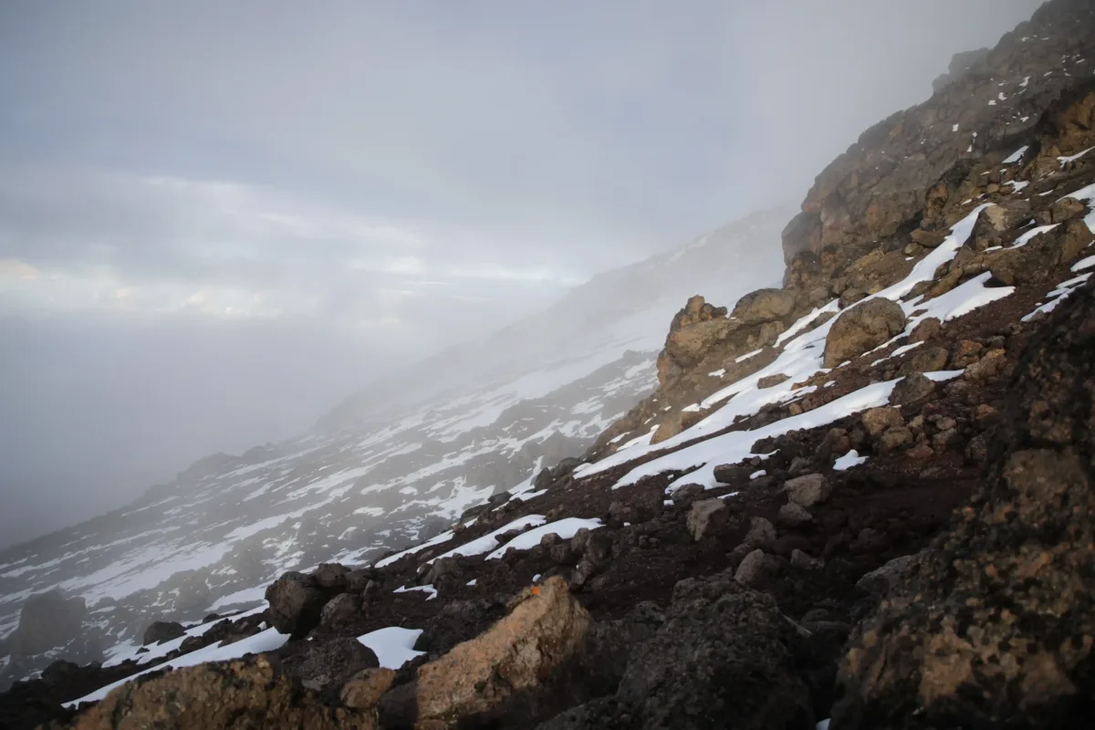 Rocky mountain slope in cloud