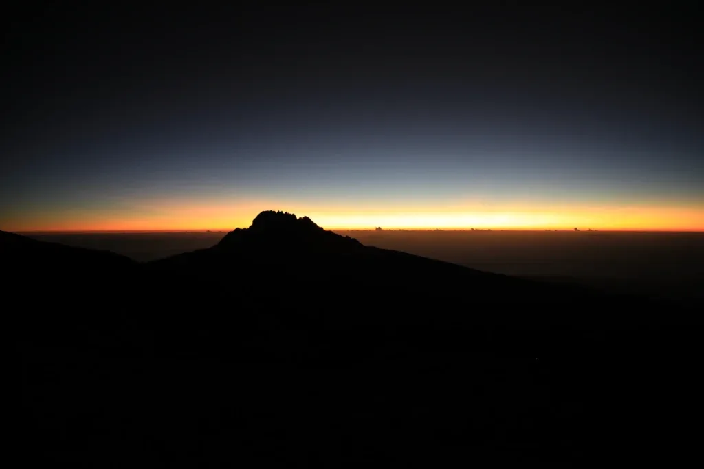 Mountain silhouette at sunrise