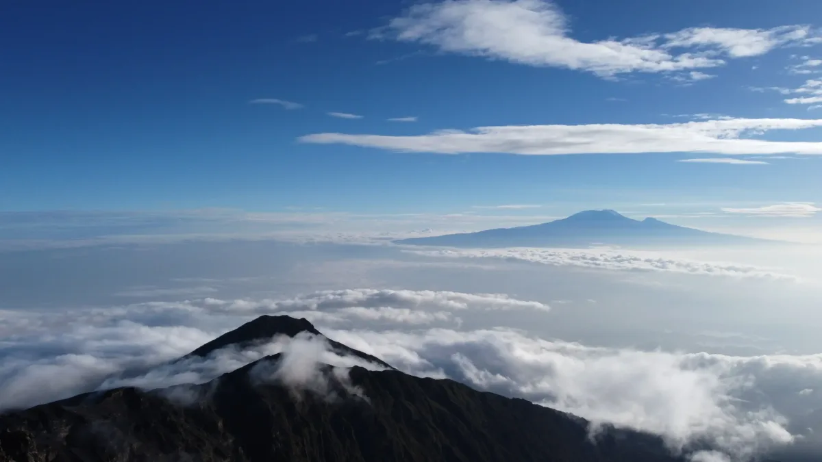Mountain peaks above a sea of clouds